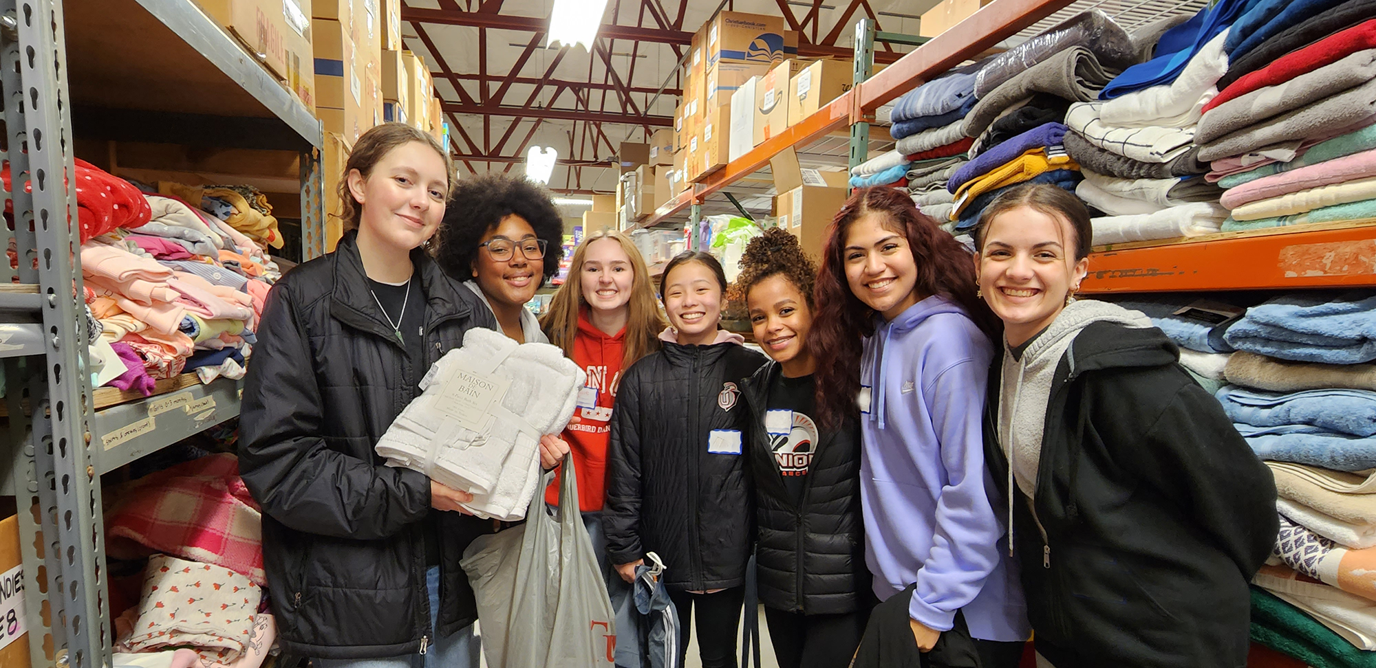 Youth volunteers in the warehouse